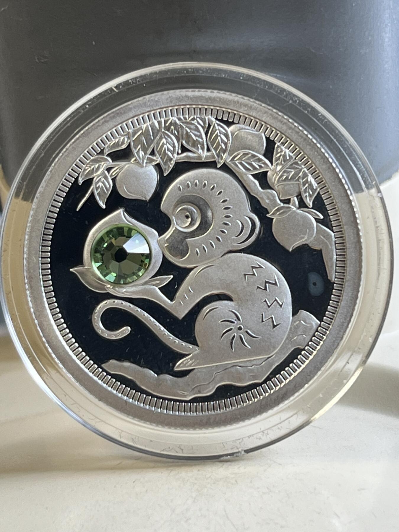 第177期拍卖【长期征集拍品】 托克劳2016年蟠桃会镶嵌绿水晶1/3盎司纪念银币，999银
