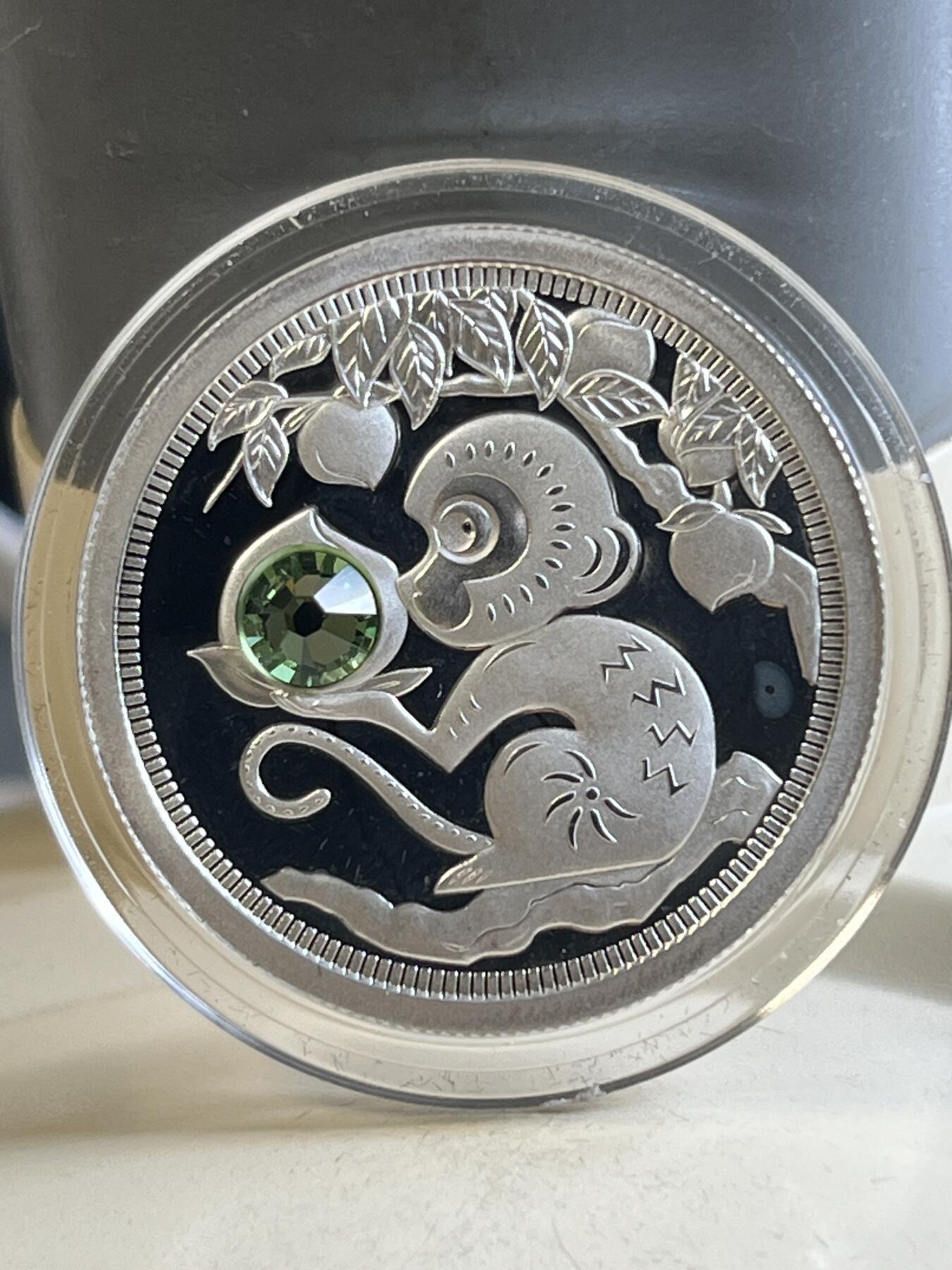 第177期拍卖【长期征集拍品】 托克劳2016年蟠桃会镶嵌绿水晶1/3盎司纪念银币，999银