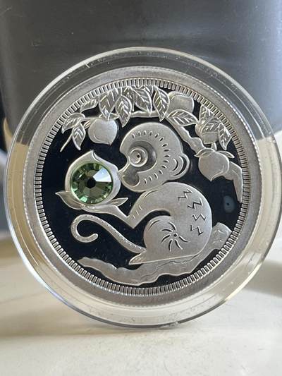 第177期拍卖【长期征集拍品】 - 托克劳2016年蟠桃会镶嵌绿水晶1/3盎司纪念银币，999银