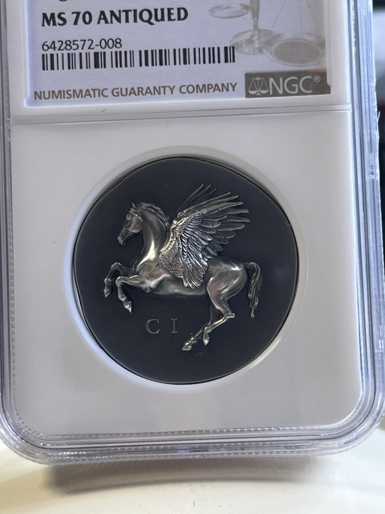 第177期拍卖【长期征集拍品】 NGC-MS70 ANTIQUED 库克2022年发行古希腊货币3（超高浮雕飞马设计）仿古银币（CIT重现千年历史货币复刻：1盎司克重，999纯银，33MM，限量999枚，盒证齐全）