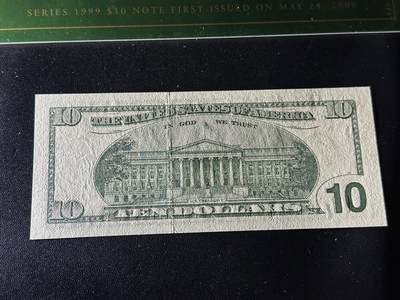 《外钞收藏家》第五百七十四期（精选场）（本平台长期征集拍品、欢迎藏友们联系合作） 1999年美国大头版10美元 数三 千位号 首发版 全新UNC