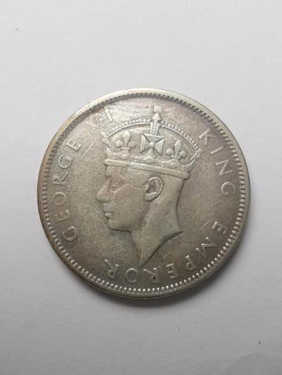 巨藏钱币第四期10月13号20点开拍 英属斐济1943年1先令银币5.6克乔治六世