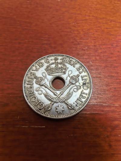 长老汇蛇年精选第六十场拍卖 - 1935英属新几内亚乔治五世1先令中孔银币，5.38克925银