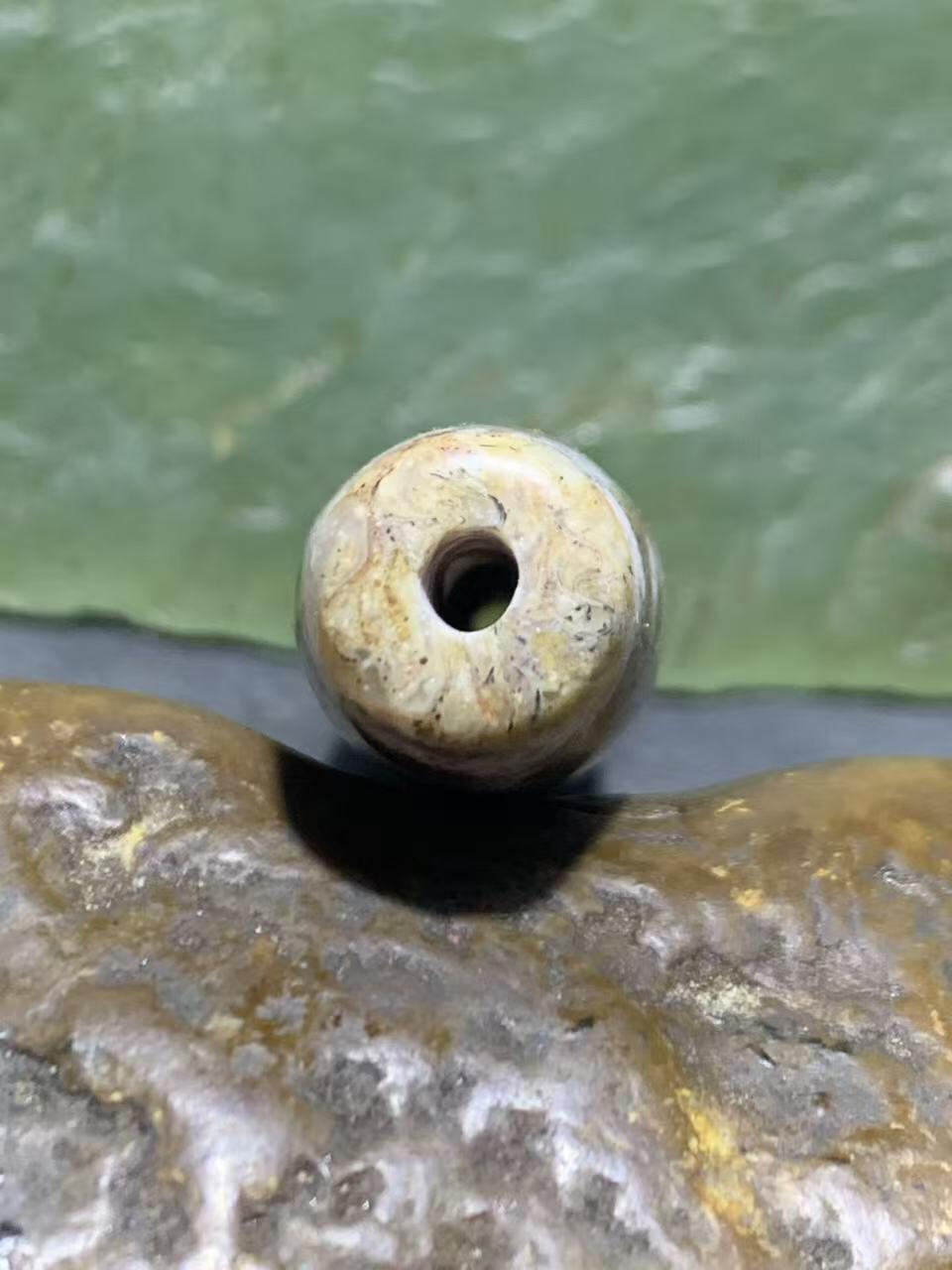 精品藏传象雄朱砂九眼天珠一颗