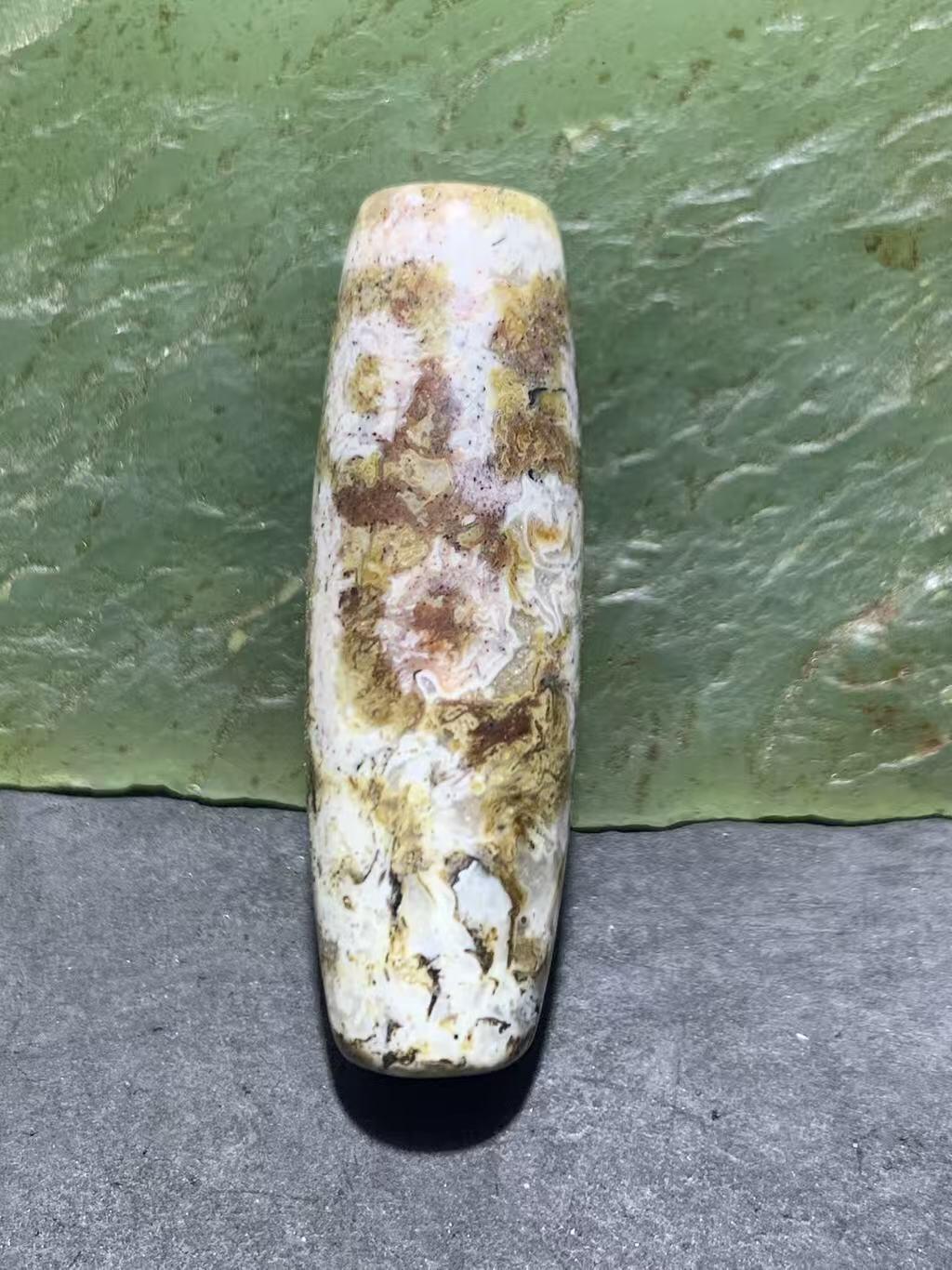 精品藏传象雄朱砂九眼天珠一颗