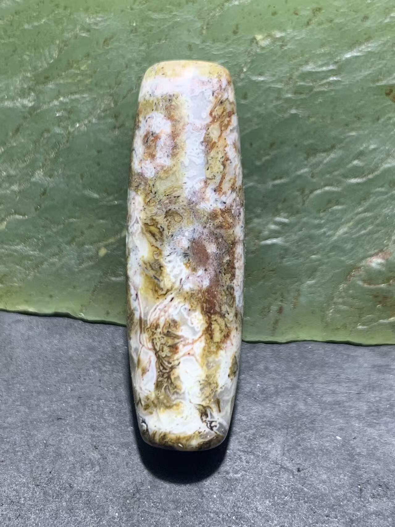 精品藏传象雄朱砂九眼天珠一颗