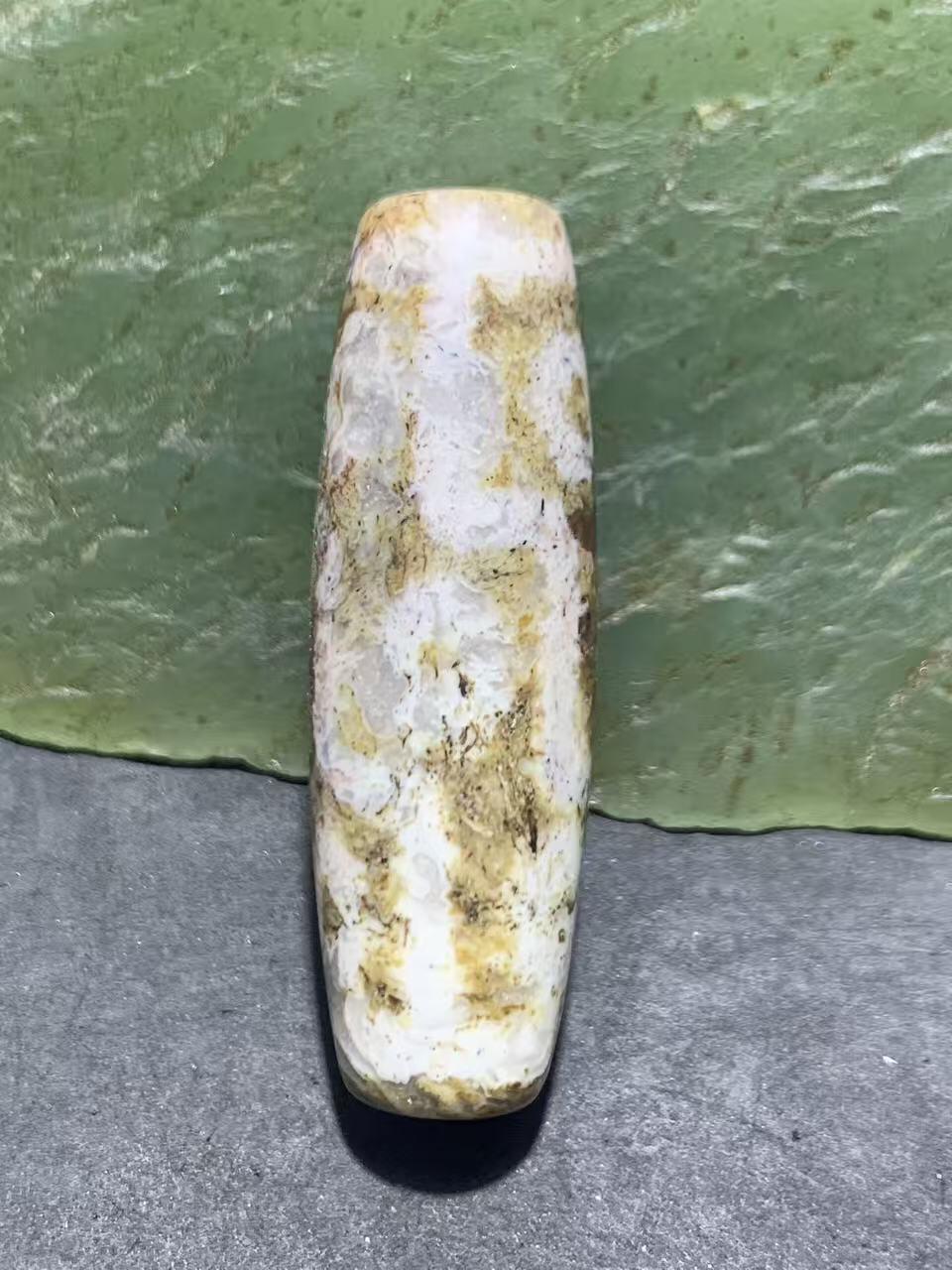 精品藏传象雄朱砂九眼天珠一颗