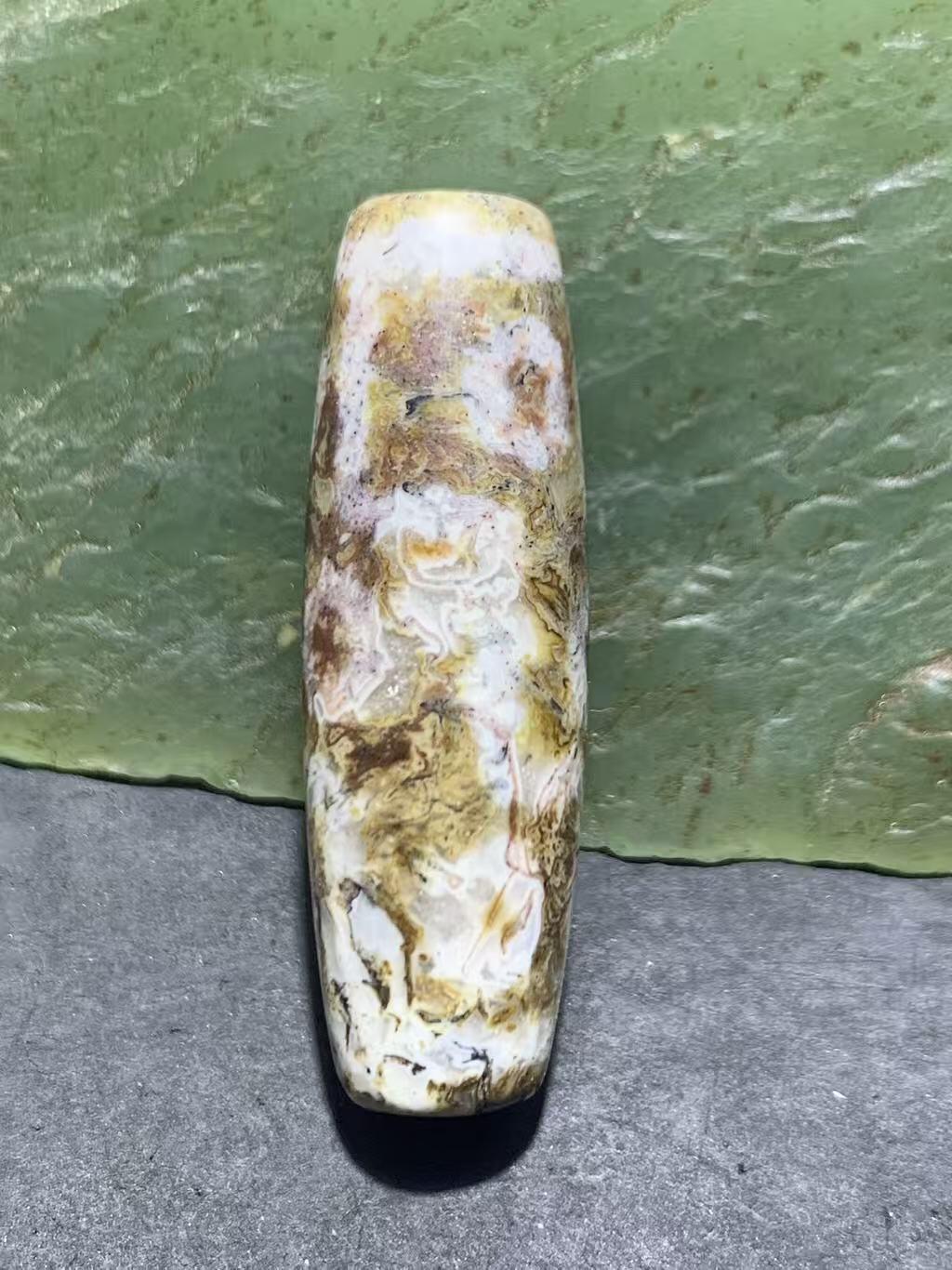 精品藏传象雄朱砂九眼天珠一颗