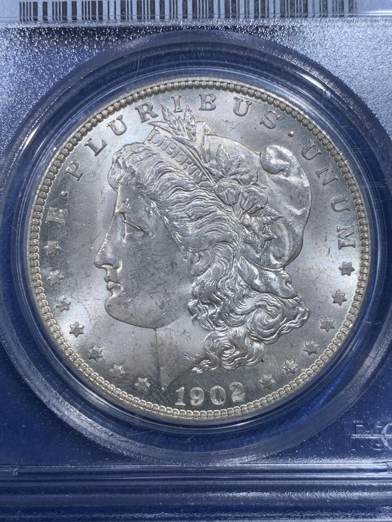 《竞宝斋》第427场 周日，周一  2场连拍 （全场包邮） PCGS MS64 美国1902年O版摩根一元银币 白净好品 上沿支撑架有磕 细节见图