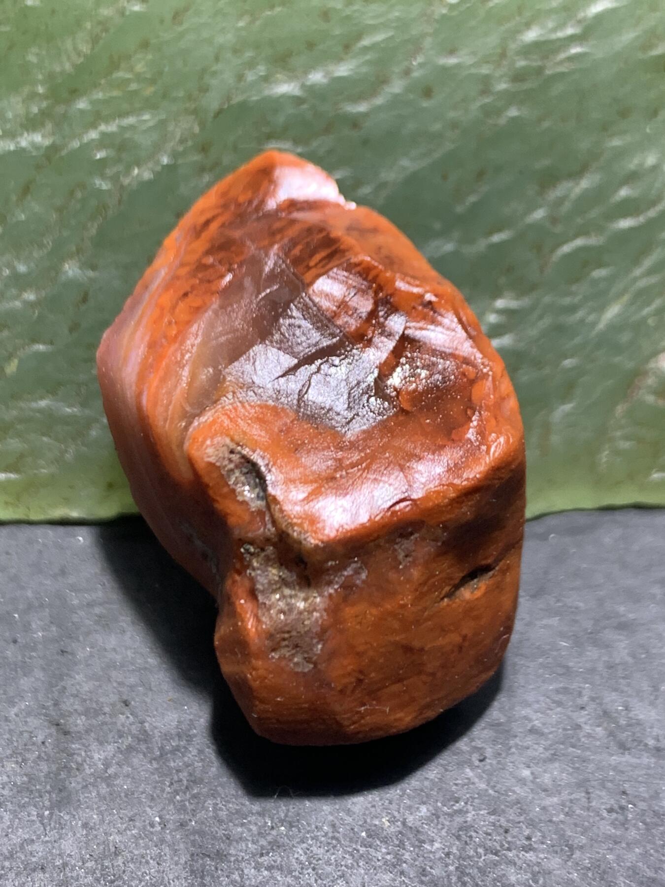 精美带皮冻料柿子红南红玛瑙明料原石一颗