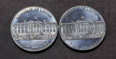 北京马甸外国币专卖第145期，外国币专场，陆续上拍，欢迎关注 利比里亚5dollars，总统布什和切尼及白宫纪念币38.5mm，2枚