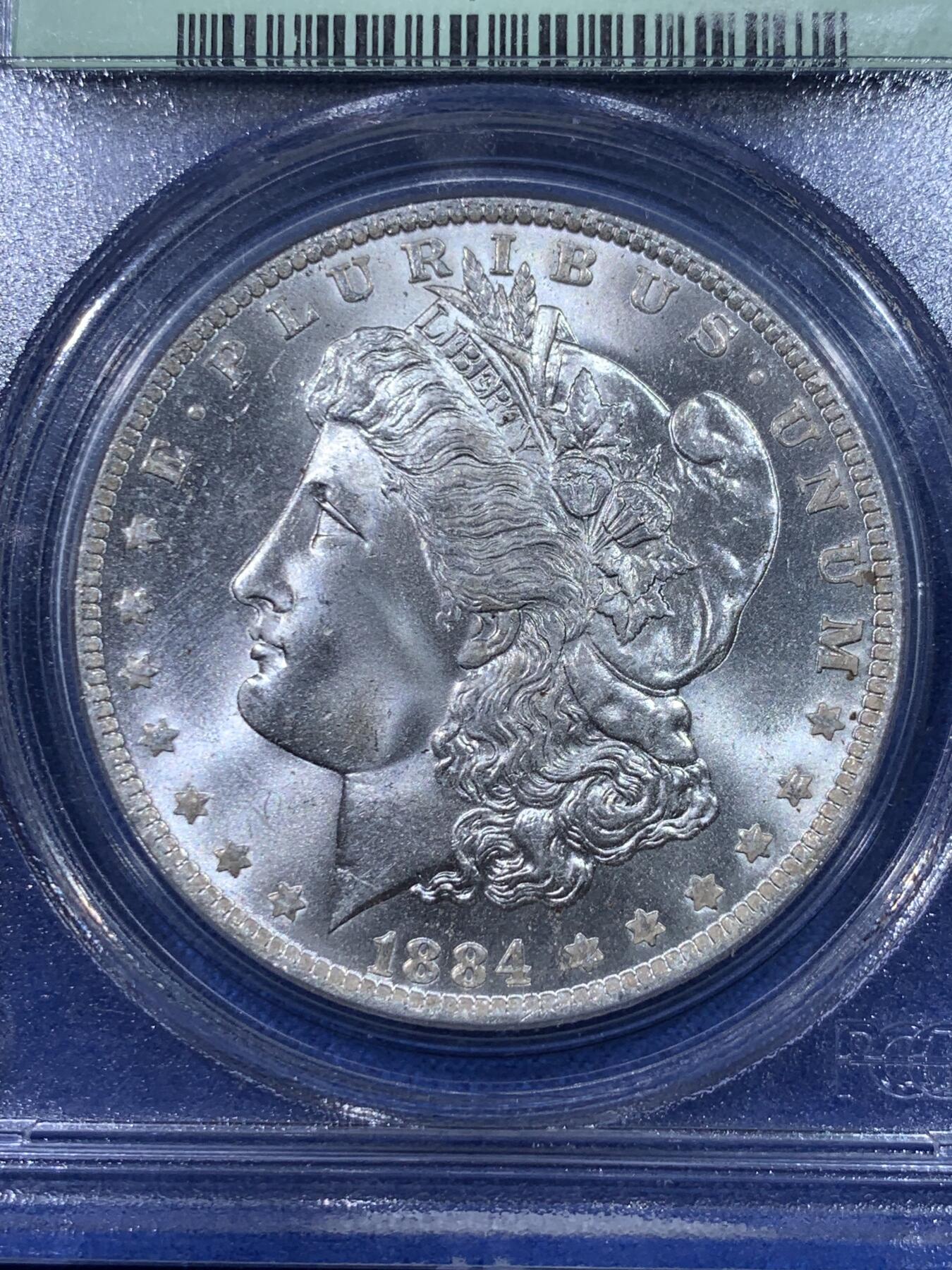 《竞宝斋》第428场 周日，周一  2场连拍 （全场包邮） PCGS MS65 美国 1884年 摩根银币 绿盒 细节光度都不错 值得珍藏