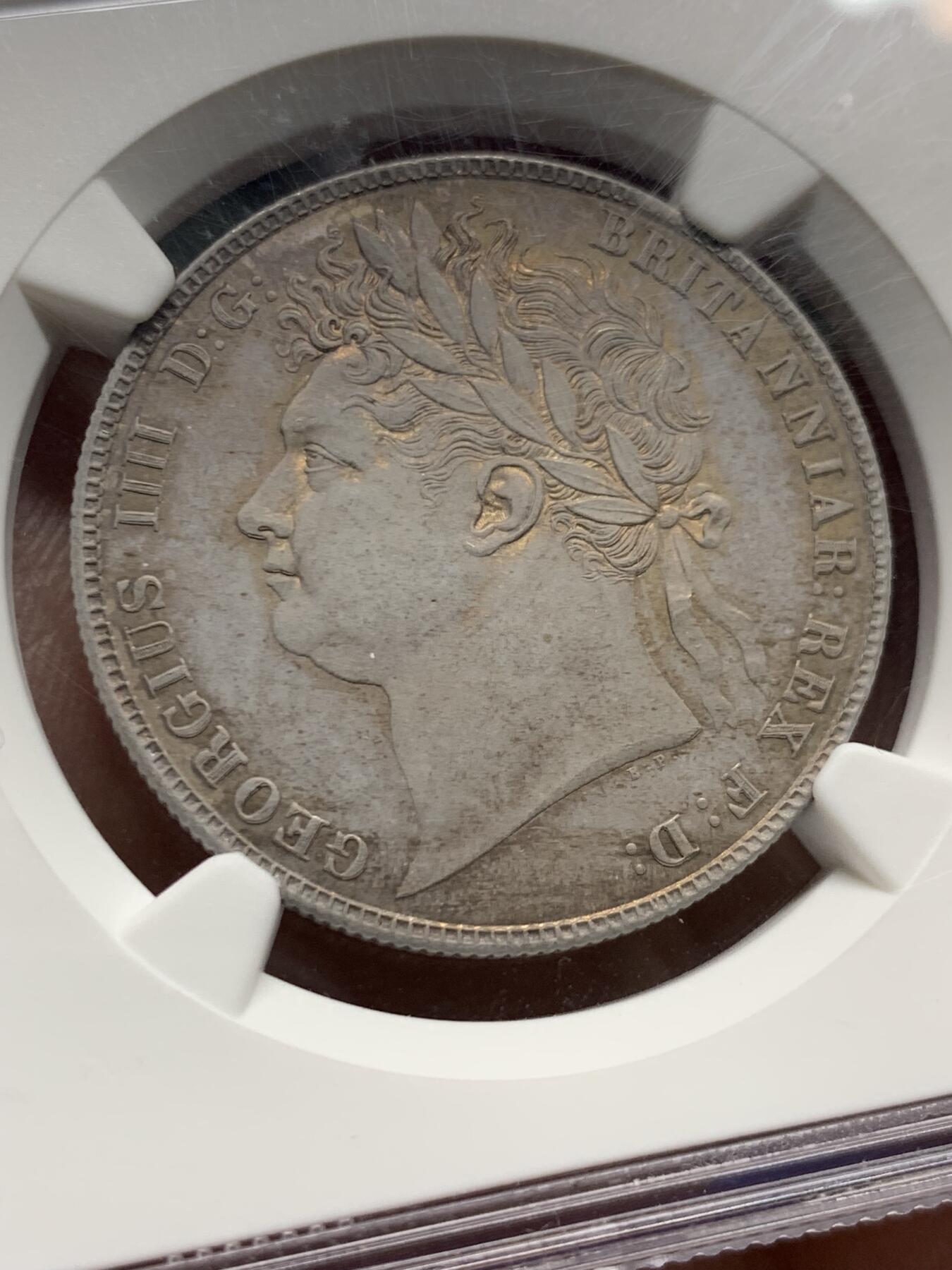 《竞宝斋》第428场 周日，周一  2场连拍 （全场包邮） 唯一亚军分 NGC MS64+ 英国 1824年 乔治四世 嘉德纹章版 半克朗银币  半克朗里最少得品种 更高分仅1枚 HA 64分成交2.3W