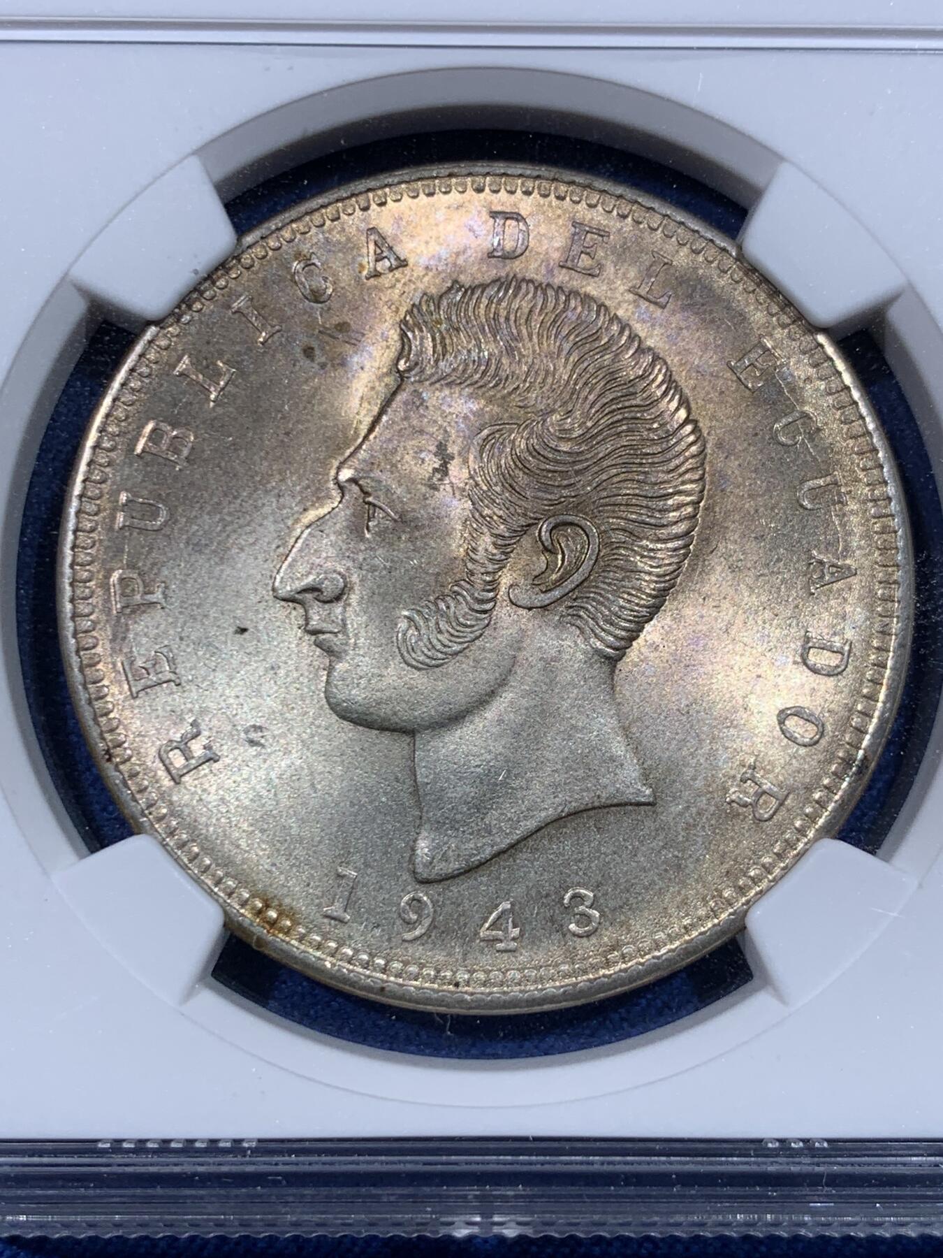 《竞宝斋》第428场 周日，周一  2场连拍 （全场包邮） NGC MS64 厄瓜多尔1943年5苏克雷银币，双面淡金彩，转光强烈细节优秀，状态一流，仅发行两个年份。
