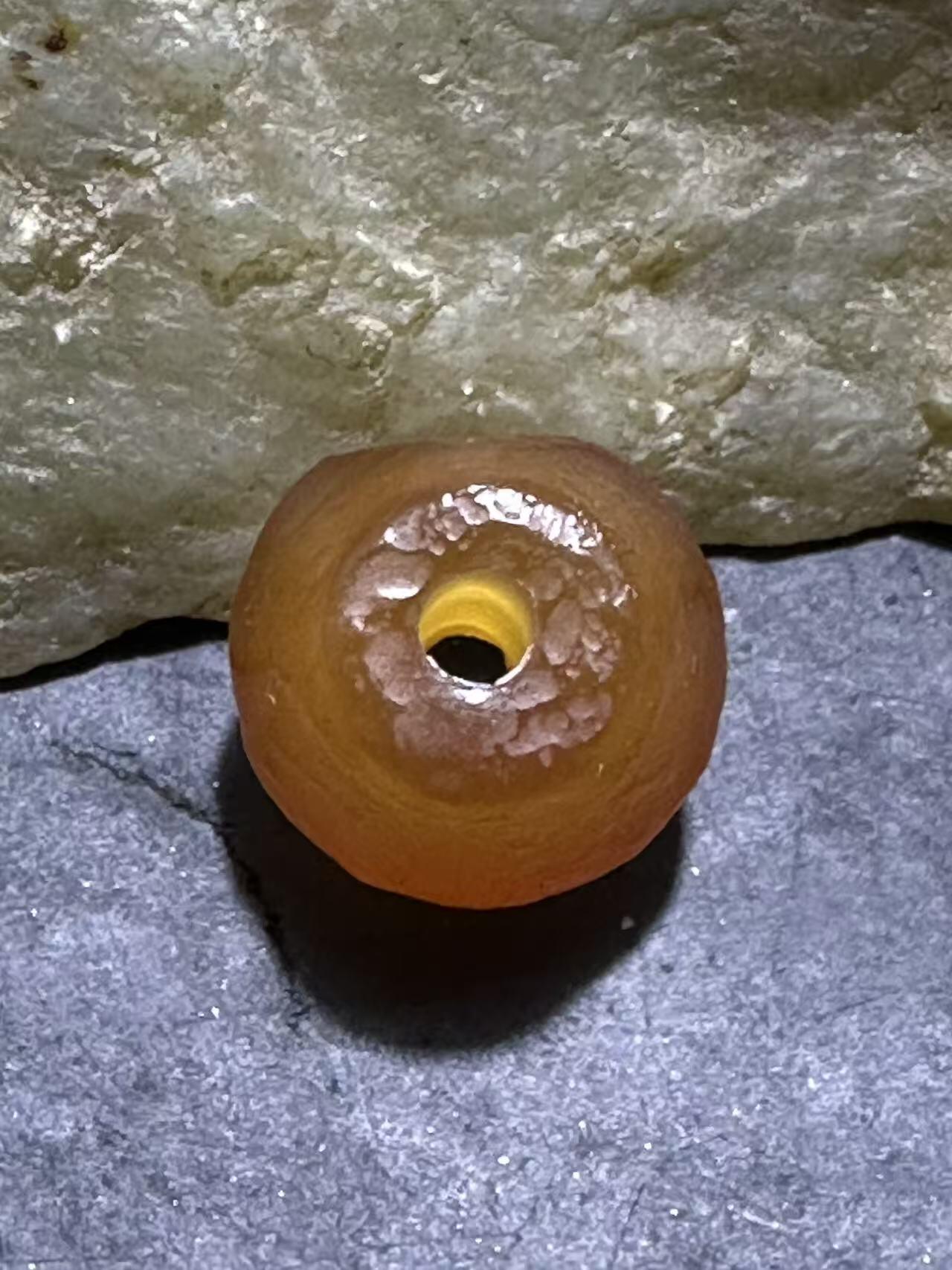 高玉化风化纹玛瑙通货随形碟珠一颗