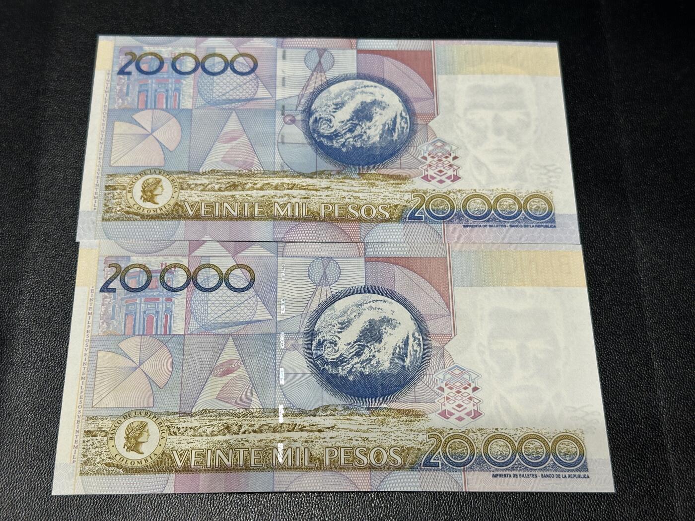《外钞收藏家》第五百七十五期（本期精选丰富品种好货、欢迎参加）（本平台长期征集拍品、欢迎藏友们联系合作） 2003和10年哥伦比亚2万 两张一起 一张全新 一张UNC-