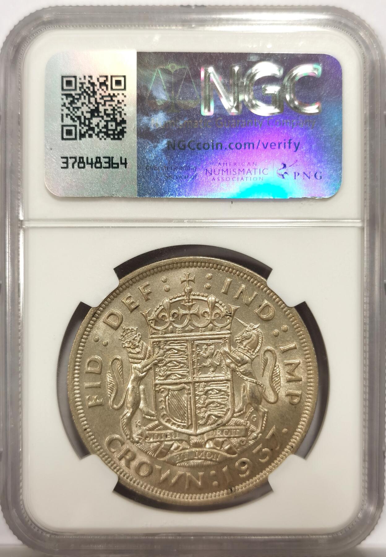 博洋堂世界钱币拍卖第143期（全场包邮） NGC MS63 英国1937年乔治六世登基1克朗银币，原汁原味老包浆，包浆醇厚，打制深峻，转光强烈细节优秀，状态极佳。