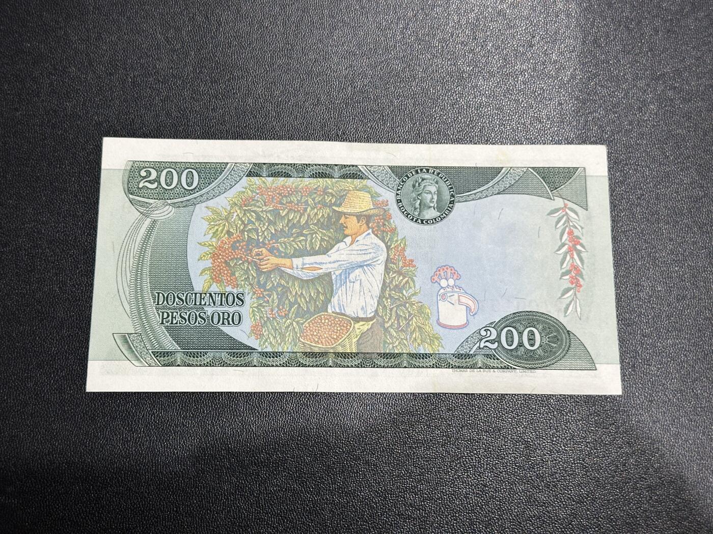 《外钞收藏家》第五百七十五期（本期精选丰富品种好货、欢迎参加）（本平台长期征集拍品、欢迎藏友们联系合作） 1978年哥伦比亚200 UNC-