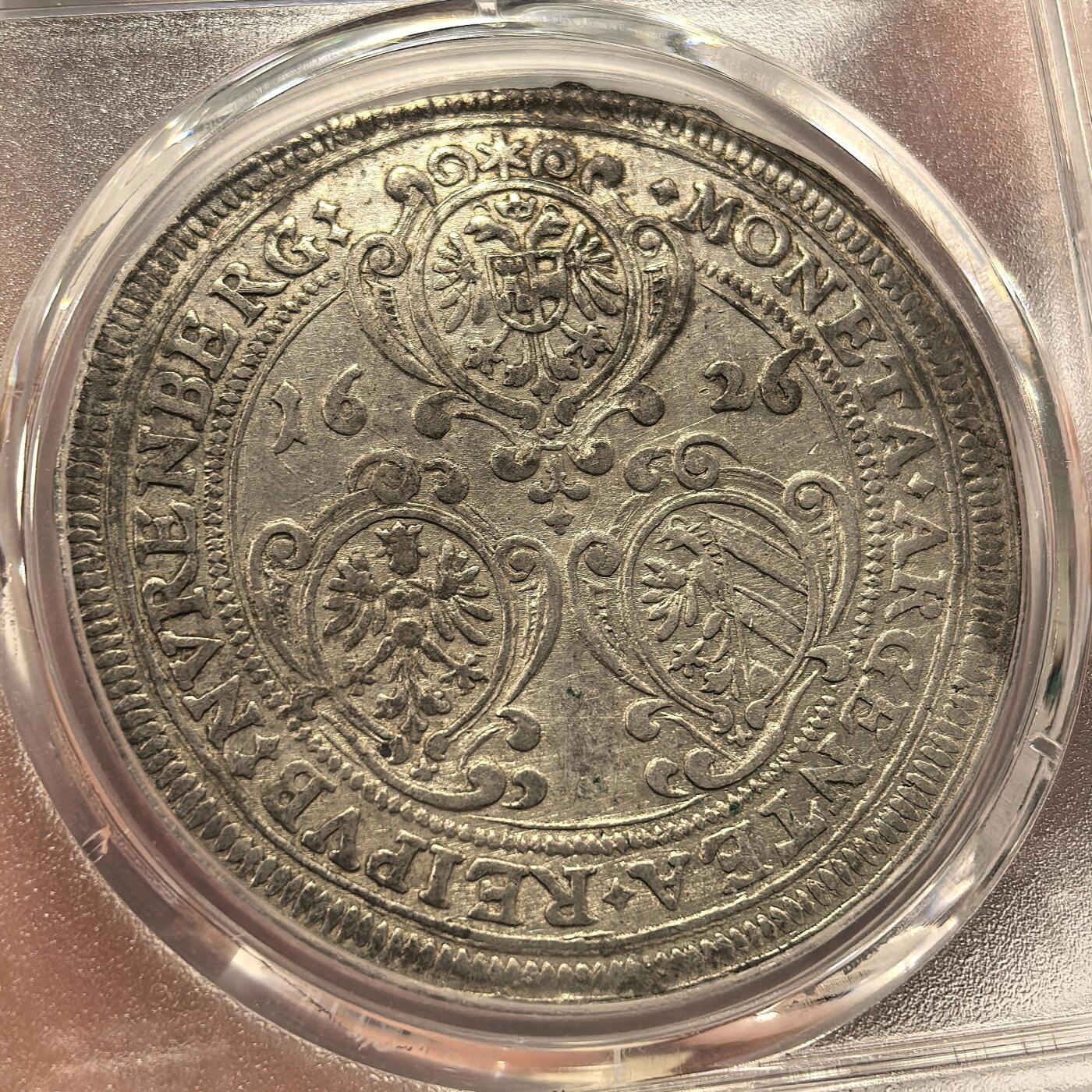 博洋堂世界钱币拍卖第143期（全场包邮） PCGS UNCD 神罗纽伦堡1626年双头鹰大泰勒银币，四百年老银币，打制清晰，羽毛饱满。