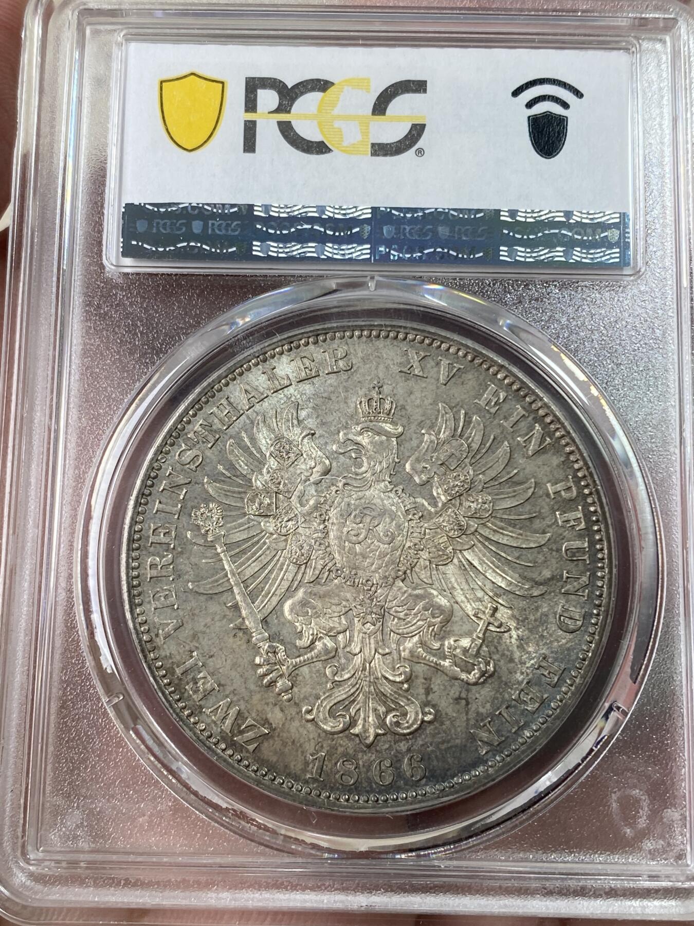 万国钱币拍卖第053期【万国秋季大拍下●周五周六两场连拍】 PCGS MS63 1866年德国普鲁士威廉一世大鸟流通2泰勒 普奥胜利年份 威廉一世发行的2泰勒中除1867C以外好品都非常罕见 欧洲原味环彩黄油转光 PC唯二冠军分 错过难寻的顶级收藏品质