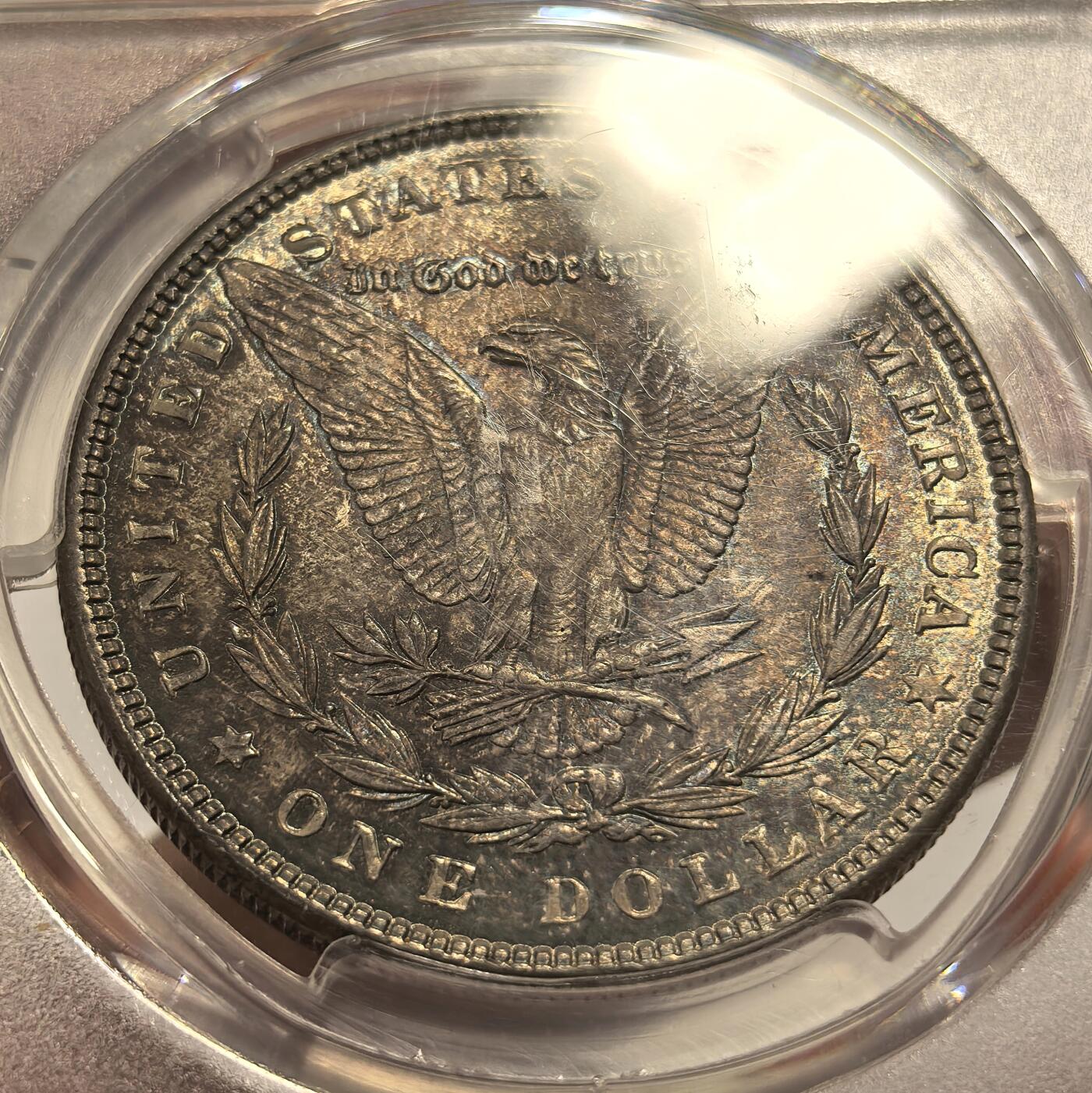 博洋堂世界钱币拍卖第143期（全场包邮） PCGS MS64 美国1886年摩根银币P版，原汁原味双面五彩老包浆，包浆醇厚润泽又犀利，打制深峻，味道币味道足，状态一流。