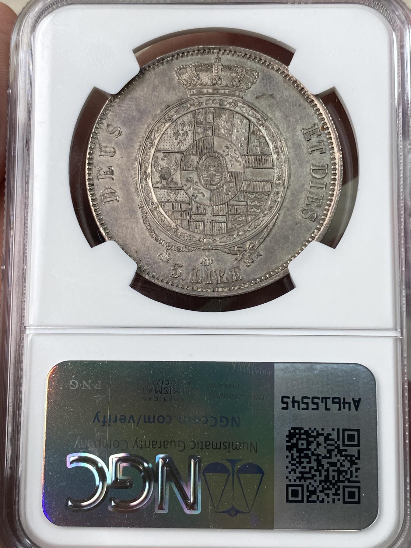 万国钱币拍卖第053期【万国秋季大拍上●周五周六两场连拍】 NGC MS64 1858年意大利-帕尔玛摄政王玛丽·路易斯与公爵罗伯特一世5里拉大银 意大利邦国大名誉品种 仅单年发行1000枚 正面为母子双人肖像 背面为帕尔马公国繁复华丽的纹章 深打轻微镜面质感 淡玫瑰彩非常美丽 好品凤毛麟角 NGC唯二冠军分