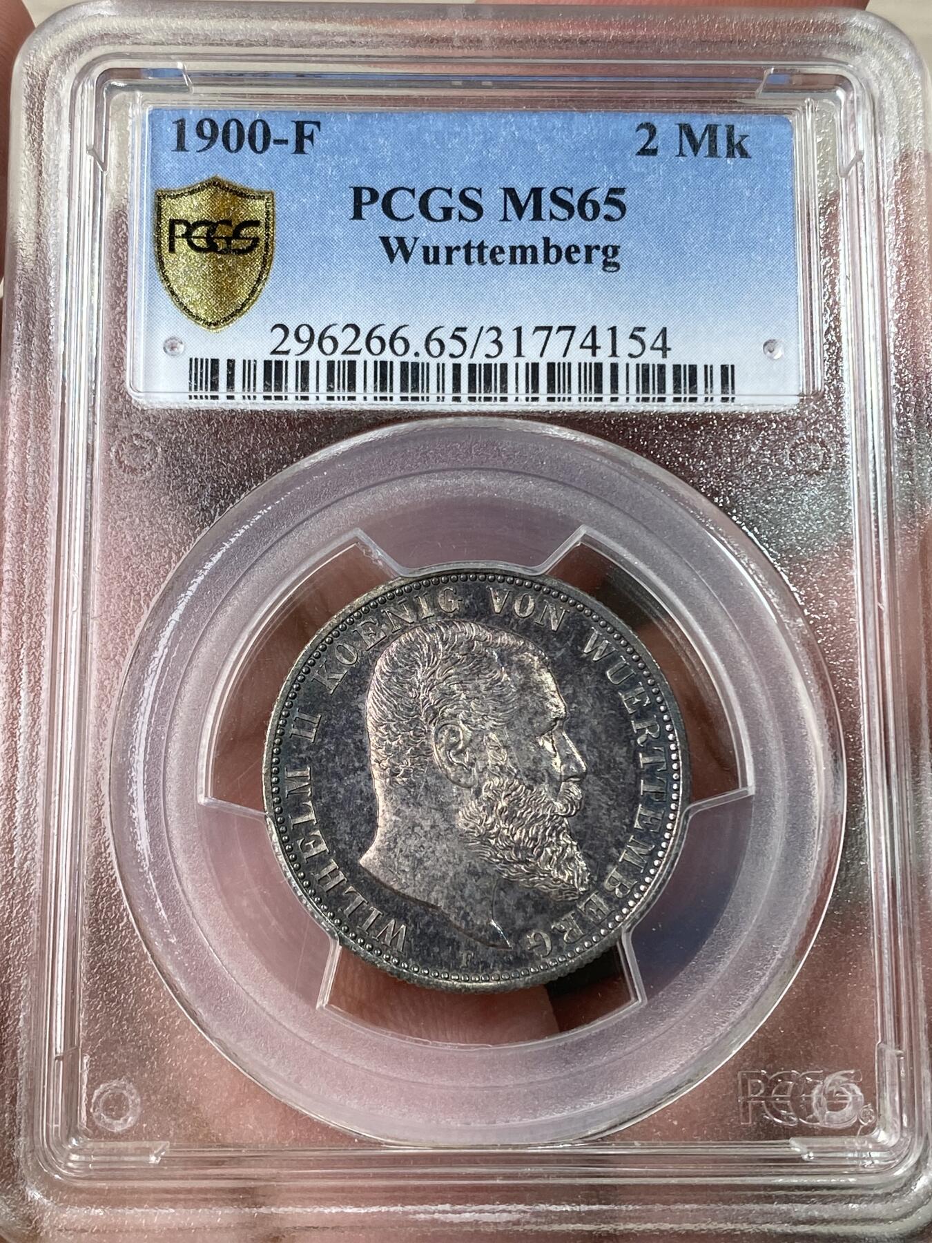 万国钱币拍卖第053期【万国秋季大拍上●周五周六两场连拍】 PCGS MS65 1900年德国符腾堡威廉二世长翅流通2马克 类精制质感 寒霜银光绝美玫瑰红彩