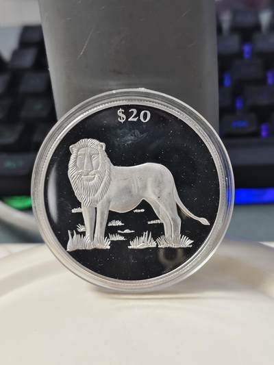 第178期拍卖【长期征集拍品】 - 利比里亚2000年动物狮子20克纪念银币，999银，20克，有氧化