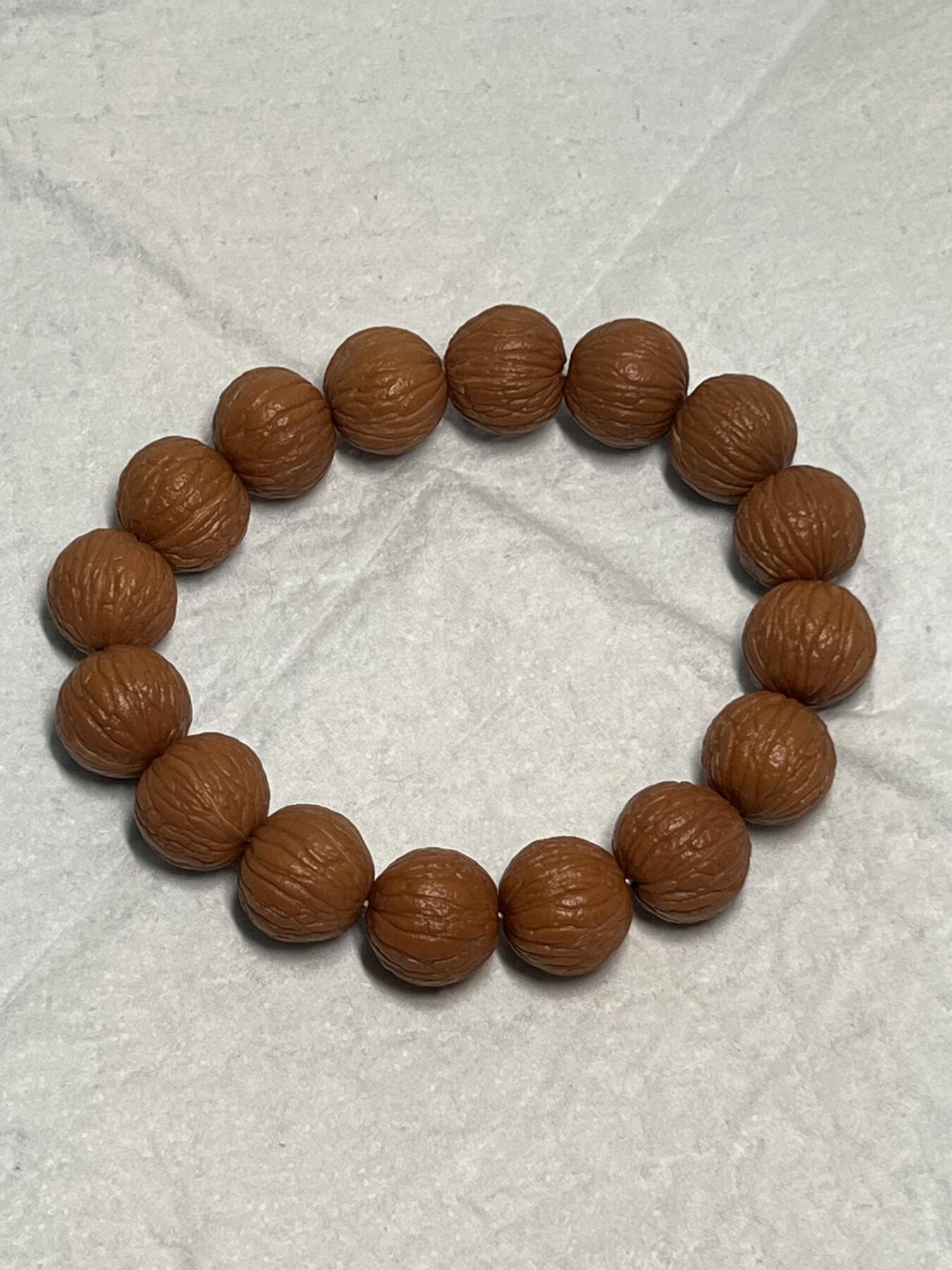 零元拍：猴头凤羽15.5MM原生态手串