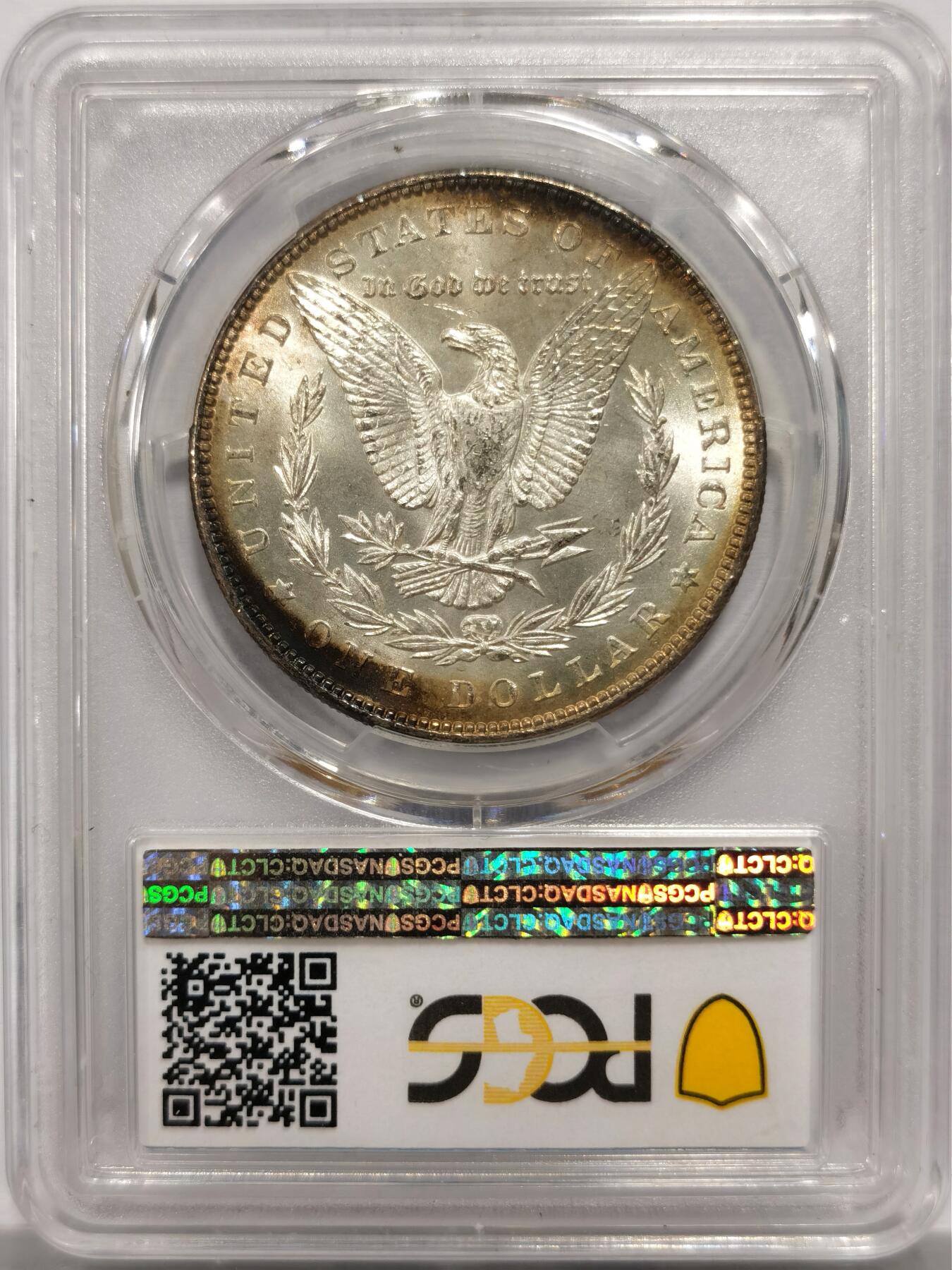 博洋堂世界钱币拍卖第143期（全场包邮） PCGS MS62 美国1887年摩根银币P厂 人像面五彩深色大月牙，月牙彩面积超过币面一半，背面浅月牙彩，两面底光充沛，明显转光效果
