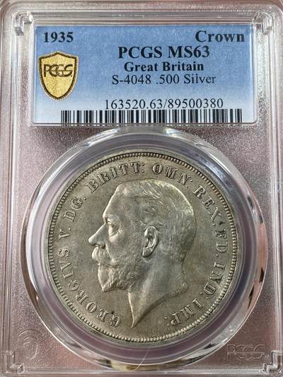 万国钱币拍卖第053期（万国秋季大拍●上） - PCGS MS63 1935年英国乔治五世木马剑1克朗 原味淡青彩
