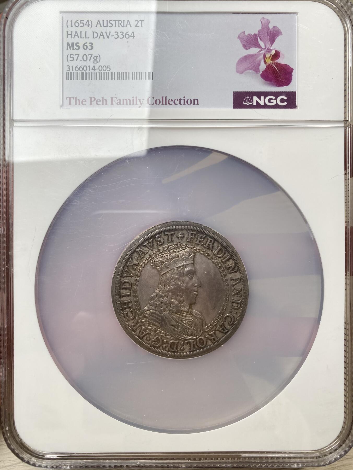 万国钱币拍卖第053期【万国秋季大拍下●周五周六两场连拍】 NGC MS63 1654年神圣罗马帝国费迪南德二世帝国鹰2泰勒大银 57.07G巨物 底板平整无减重痕 均匀醇厚的欧陆包浆 罕见的戴冠皇帝头像 此品种欧拍裸币一直都是非常昂贵的存在 神罗中的重器 新加坡船王白氏旧藏 21年HA同品种62分成交价5280美金