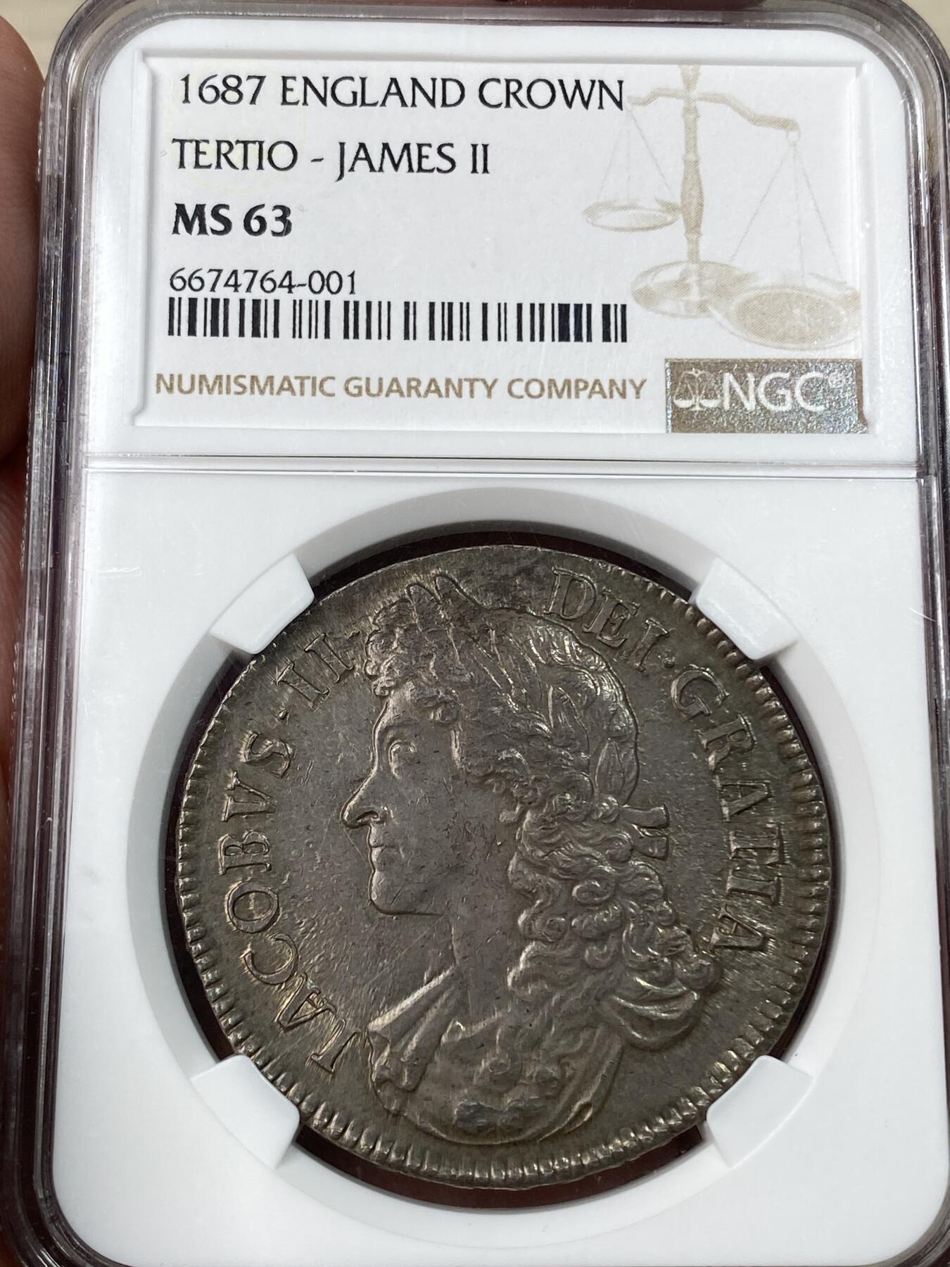 万国钱币拍卖第053期【万国秋季大拍上●周五周六两场连拍】 NGC MS63 1687年英国詹姆斯二世克朗大银 斯图亚特王朝复辟后第二位国王 全深打无减重痕非常难得 双面均匀一色的英式乌云包浆 对于一枚17世纪的英国克朗来说已是顶级典藏品质
