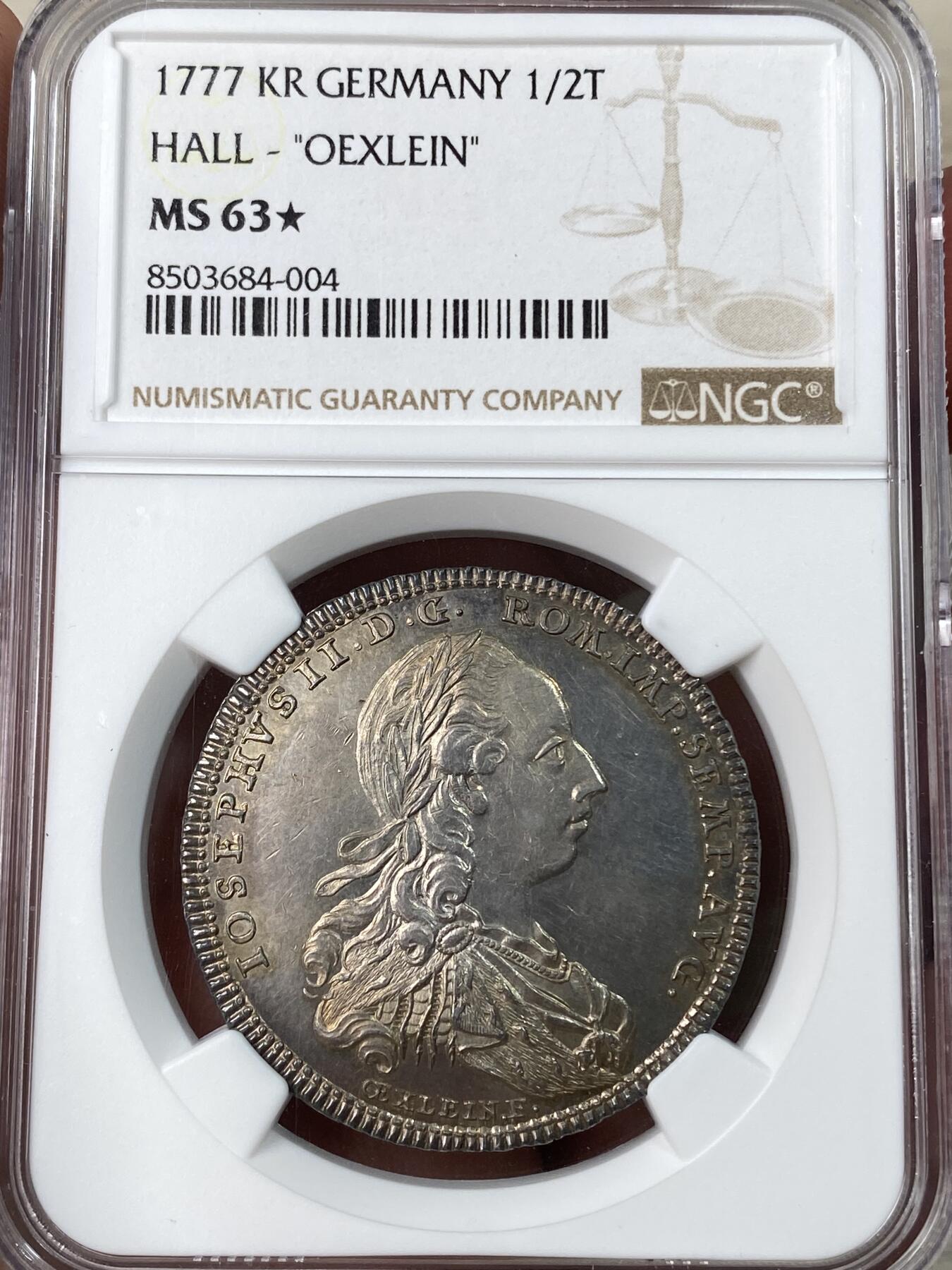 万国钱币拍卖第053期【万国秋季大拍上●周五周六两场连拍】 NGC MS63🌟 1777年神圣罗马帝国哈尔自由市约瑟夫二世盾徽半泰勒 纽伦堡造币厂铸 OEXLEIN雕刻师 仅发行406枚 超顶尖镜面深打 同时期顶级工艺 NGC星标代表着其极富冲击力的视觉效果 哈尔自由市最具代表性的品种之一