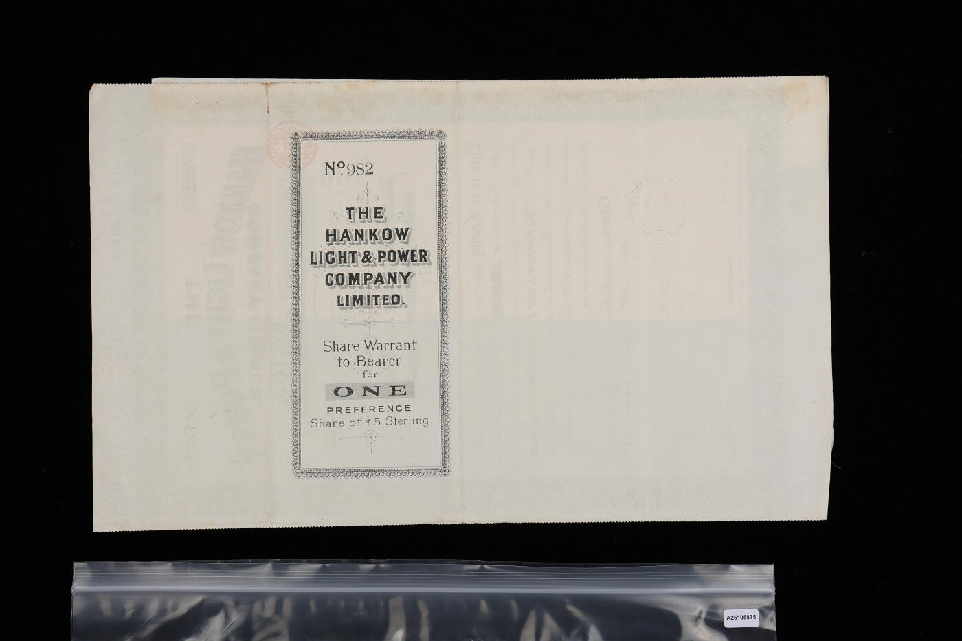 泓盛2025年秋季拍卖会 纸币 1920年英商汉口电灯电力有限公司股票，优先股1股计5英镑，此年份票十分罕见，于上海泓盛首次面世，有水印，附带息票，八成新编者按：1906年5月英国皮货商卜劳德集资3万英镑在界限路8号（现江岸区合作路22号）成立汉口电灯电力有限公司，公司大楼早在一年前即开始兴建，由景明洋行设计、汉协盛营造厂施工，安装3台总容量125千瓦的小型直流发电机。甫一成立即开始向英租界内供电，当年秋季开始德、法租界