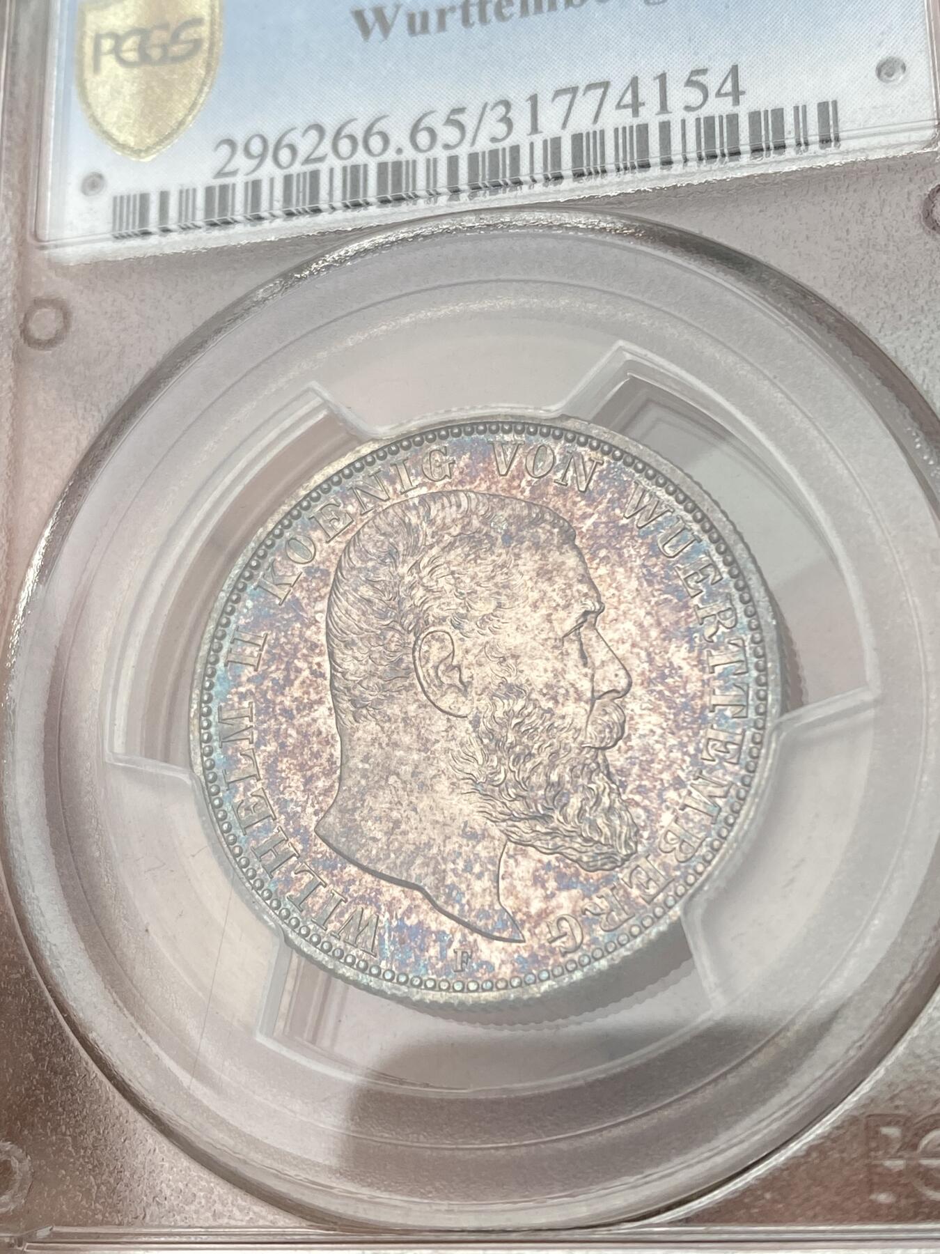万国钱币拍卖第053期【万国秋季大拍上●周五周六两场连拍】 PCGS MS65 1900年德国符腾堡威廉二世长翅流通2马克 类精制质感 寒霜银光绝美玫瑰红彩