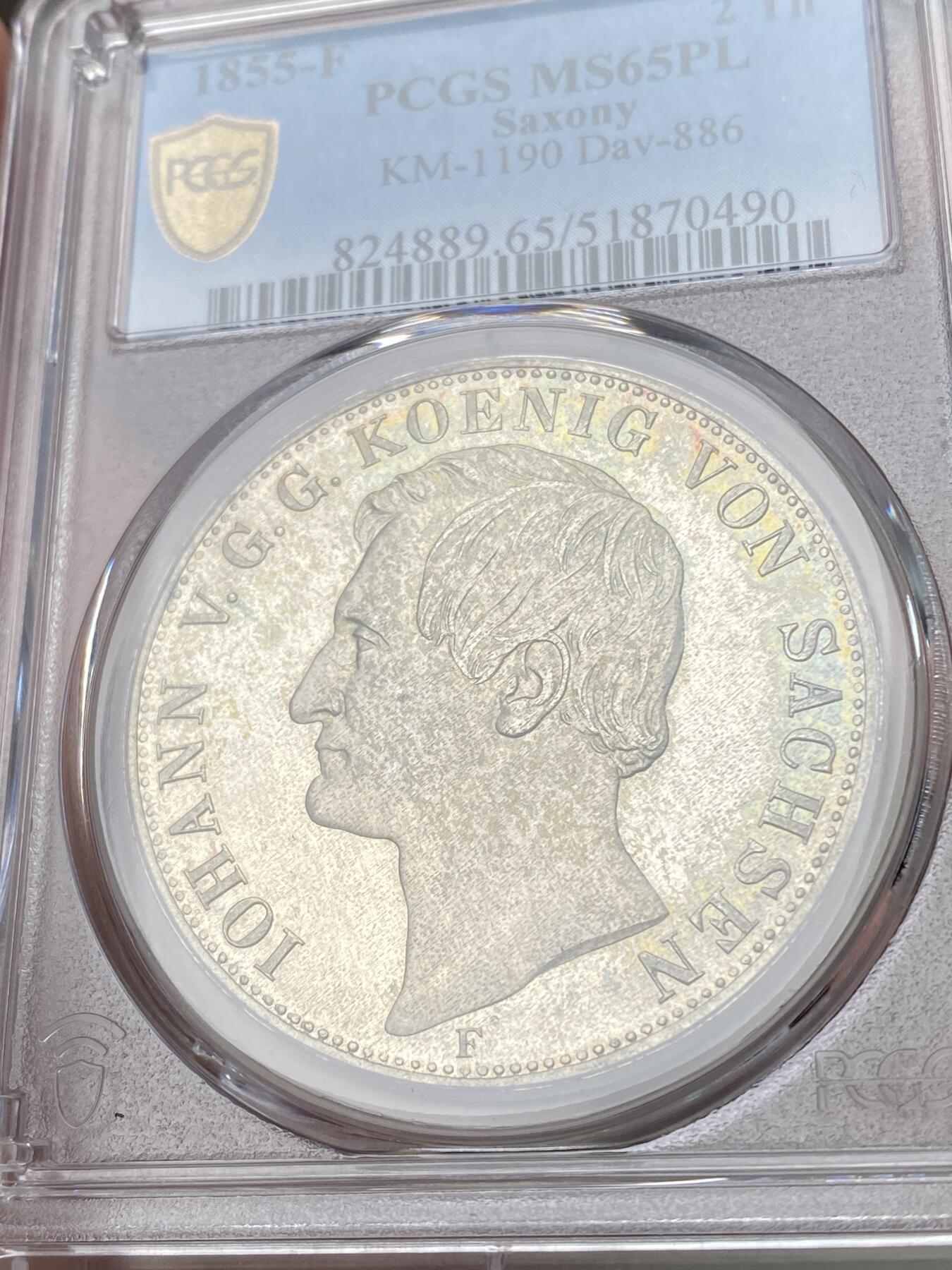 万国钱币拍卖第053期【万国秋季大拍下●周五周六两场连拍】 PCGS MS65PL 1855年萨克森流通纹章2泰勒 工艺明显区别与普通流通版本的一枚 无限接近于PF的质感 底板深度镜面 人像和纹章喷砂感极强 实物上手非常明显 应该也很难再找出类似状态的一枚了 NGC&PCGS双料冠军分