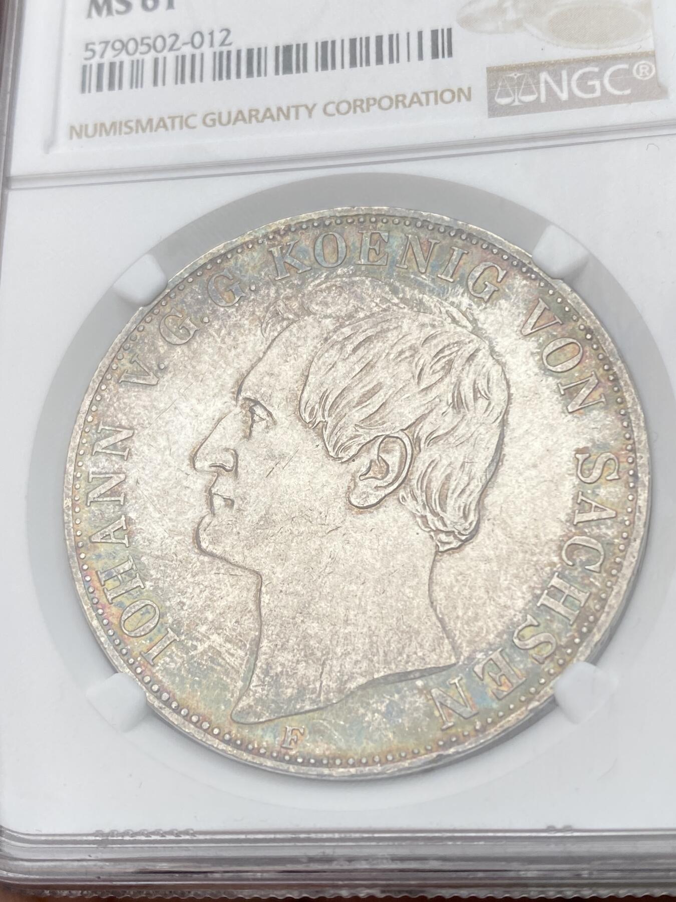 万国钱币拍卖第053期【万国秋季大拍上●周五周六两场连拍】 NGC MS61 1859年萨克森约翰五世大窗帘流通2泰勒 孔雀绿彩包浆环绕 原味德式老彩 收藏级状态