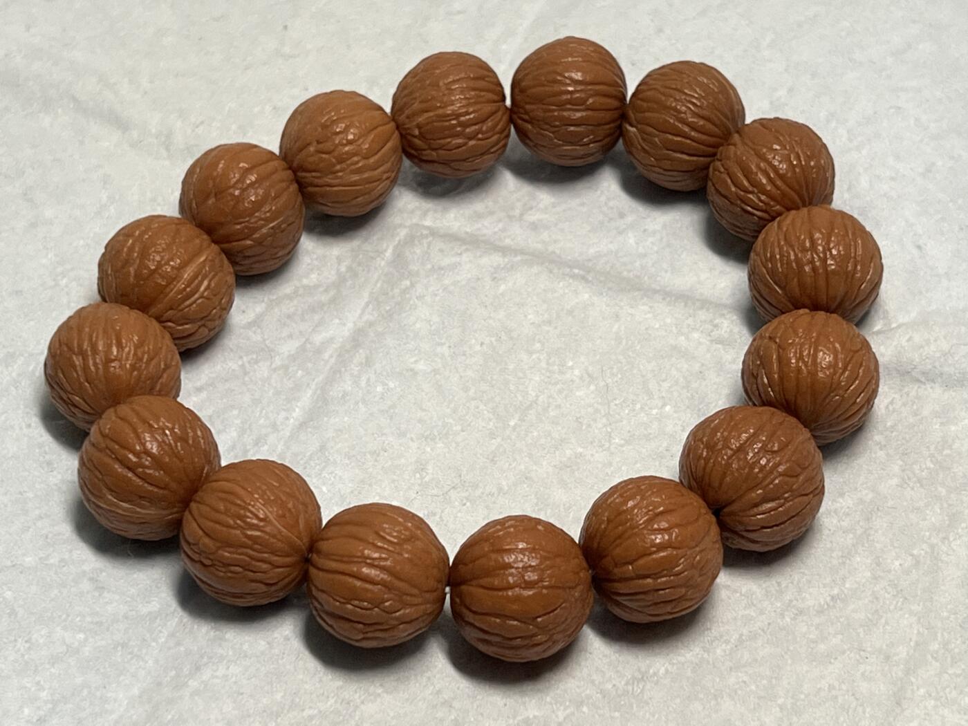 零元拍：猴头凤羽15.5MM原生态手串