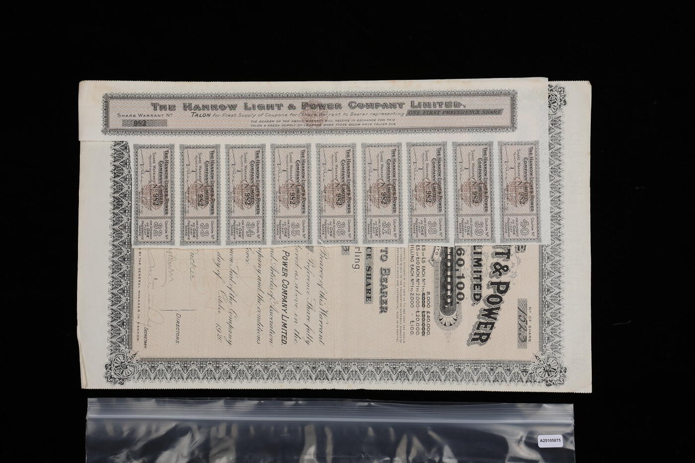 泓盛2025年秋季拍卖会 纸币 1920年英商汉口电灯电力有限公司股票，优先股1股计5英镑，此年份票十分罕见，于上海泓盛首次面世，有水印，附带息票，八成新编者按：1906年5月英国皮货商卜劳德集资3万英镑在界限路8号（现江岸区合作路22号）成立汉口电灯电力有限公司，公司大楼早在一年前即开始兴建，由景明洋行设计、汉协盛营造厂施工，安装3台总容量125千瓦的小型直流发电机。甫一成立即开始向英租界内供电，当年秋季开始德、法租界