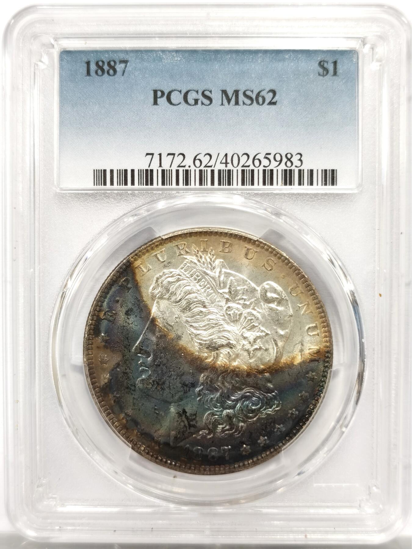 博洋堂世界钱币拍卖第143期（全场包邮） PCGS MS62 美国1887年摩根银币P厂 人像面五彩深色大月牙，月牙彩面积超过币面一半，背面浅月牙彩，两面底光充沛，明显转光效果