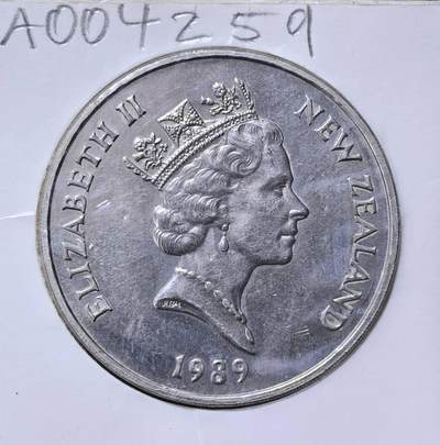 北京马甸外国币专卖第145期，外国币专场，陆续上拍，欢迎关注 新西兰1989年英联邦运动会一元克朗型纪念币