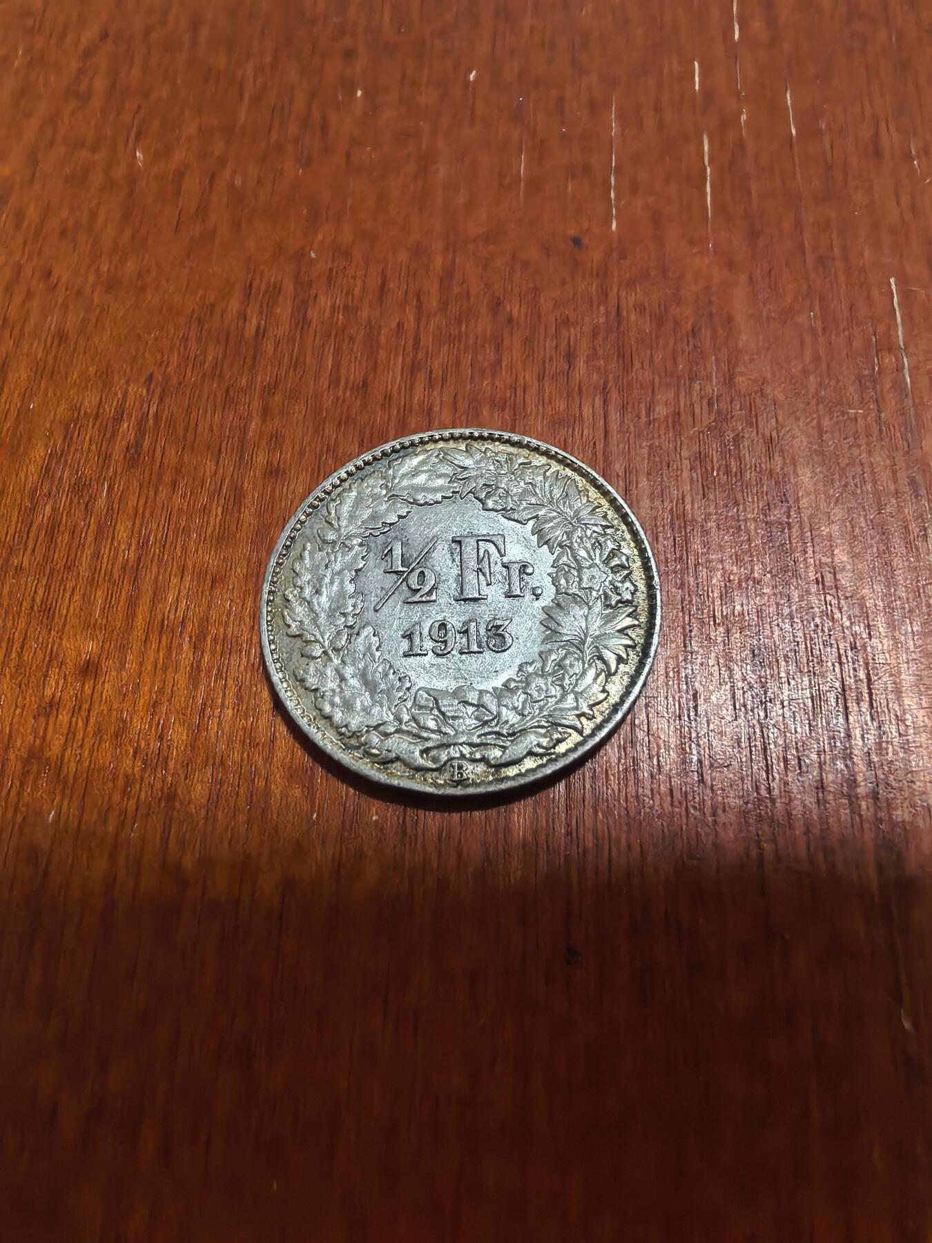 长老汇蛇年精选第六十二场拍卖 1913瑞士女神1/2法郎银币，2.5克835银，小年，克书60分90美金