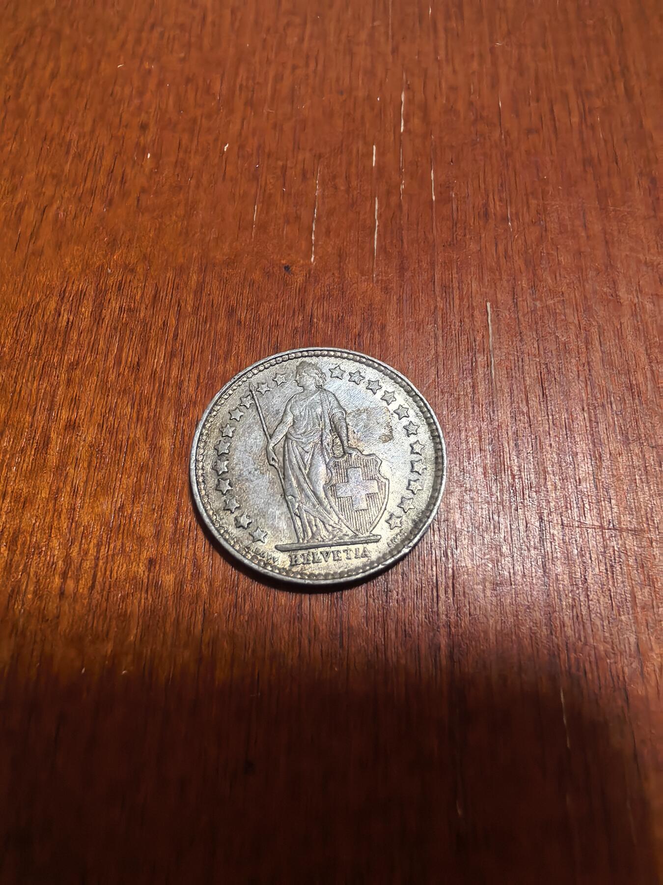 长老汇蛇年精选第六十二场拍卖 1913瑞士女神1/2法郎银币，2.5克835银，小年，克书60分90美金