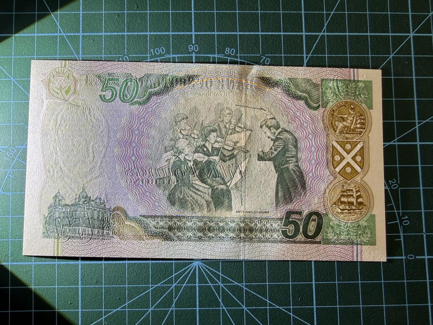 【炜奕收藏】，第四十七期 2006年苏格兰银行50镑，UNC品相，中夹豹子号号码无4，和上一张头5位同号