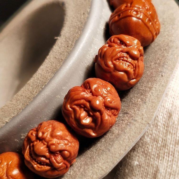 听雨轩（三）古玩杂相专场 龙纹桃核雕刻 恶僧佛爷 尺寸1.2 矮桩正圆小核桃手串