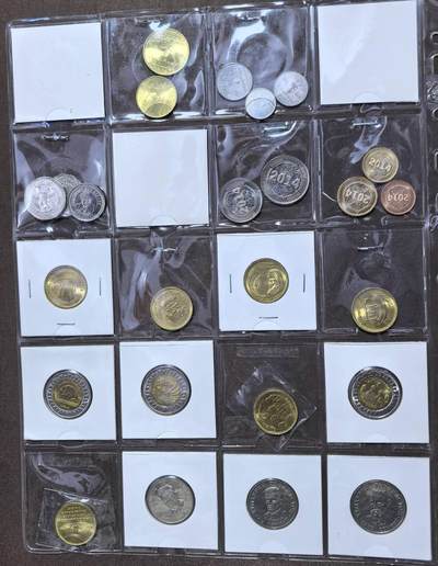 北京马甸外国币专卖第145期，外国币专场，陆续上拍，欢迎关注 沙特，埃及，津巴布韦，塞拉利昂，塔吉克斯坦：套币，纪念币，散币。如图