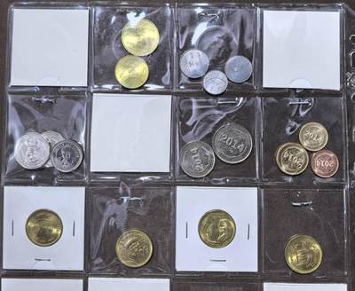 北京马甸外国币专卖第145期，外国币专场，陆续上拍，欢迎关注 沙特，埃及，津巴布韦，塞拉利昂，塔吉克斯坦：套币，纪念币，散币。如图