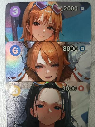 花开卡拍第43期（10月19号周日截拍，品控勿拍!!!拍品不寄存，运费5元，自制卡难免瑕疵，可能存在轻微撞角爆边等出厂瑕疵，品控介意勿拍！） - 海贼王 娜美&罗宾彩闪小套卡 3张