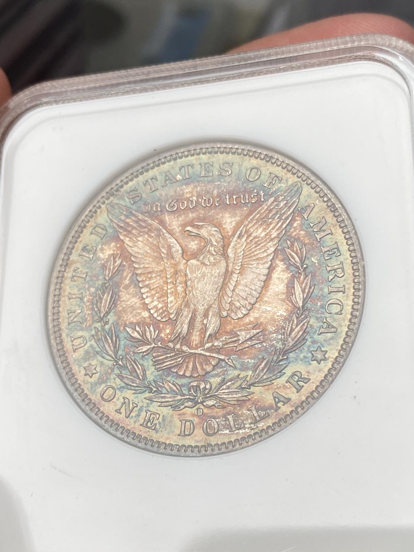 万国钱币拍卖第053期【万国秋季大拍下●周五周六两场连拍】 NGC MS65 1900年O版美国摩根女神一美元银币 BU金属质感油彩包浆 NGC老盒状态舒适